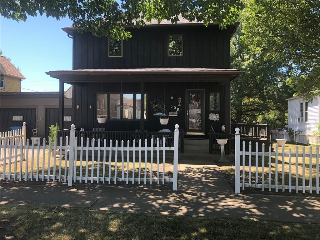 a front view of a house with a porch