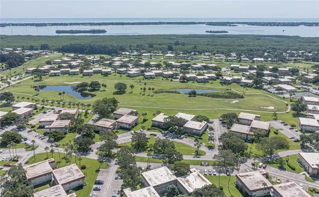 a view of a lake with a houses
