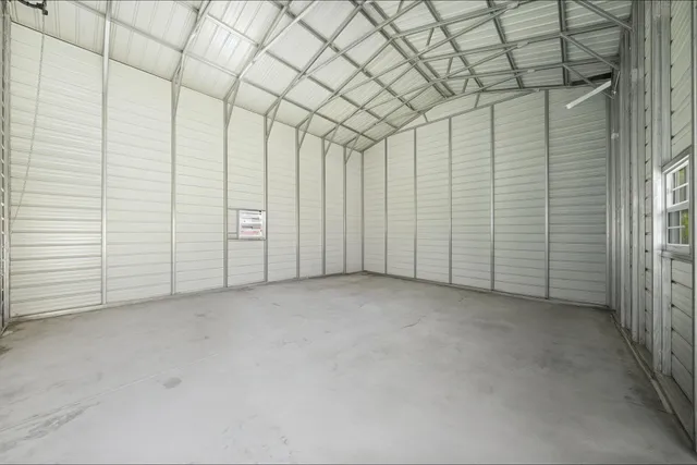 a view of a room with white walls