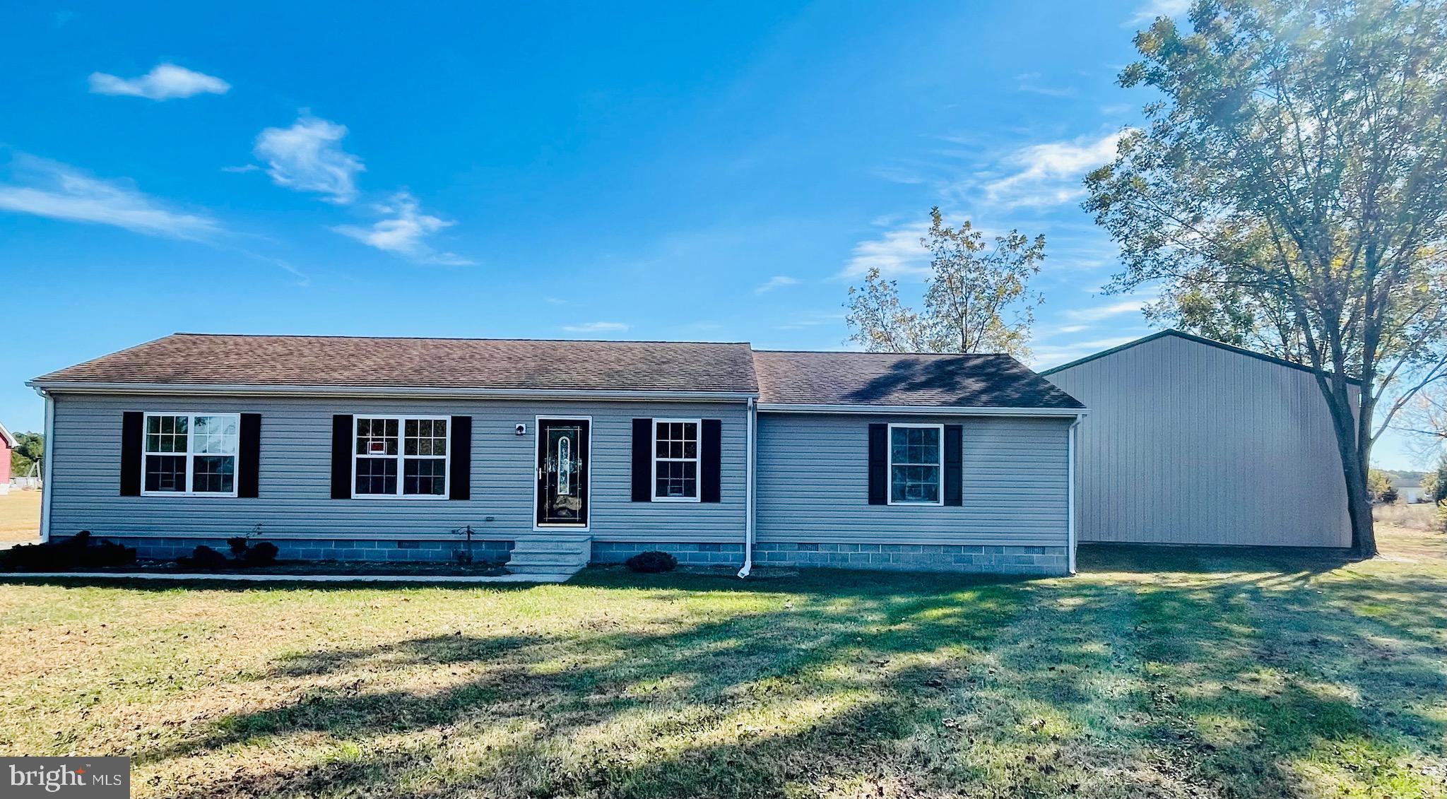 5707 Galestown - Reliance Road Rhodesdale, MD 21659 - Photo 1 of 33 front view of a house with a yard