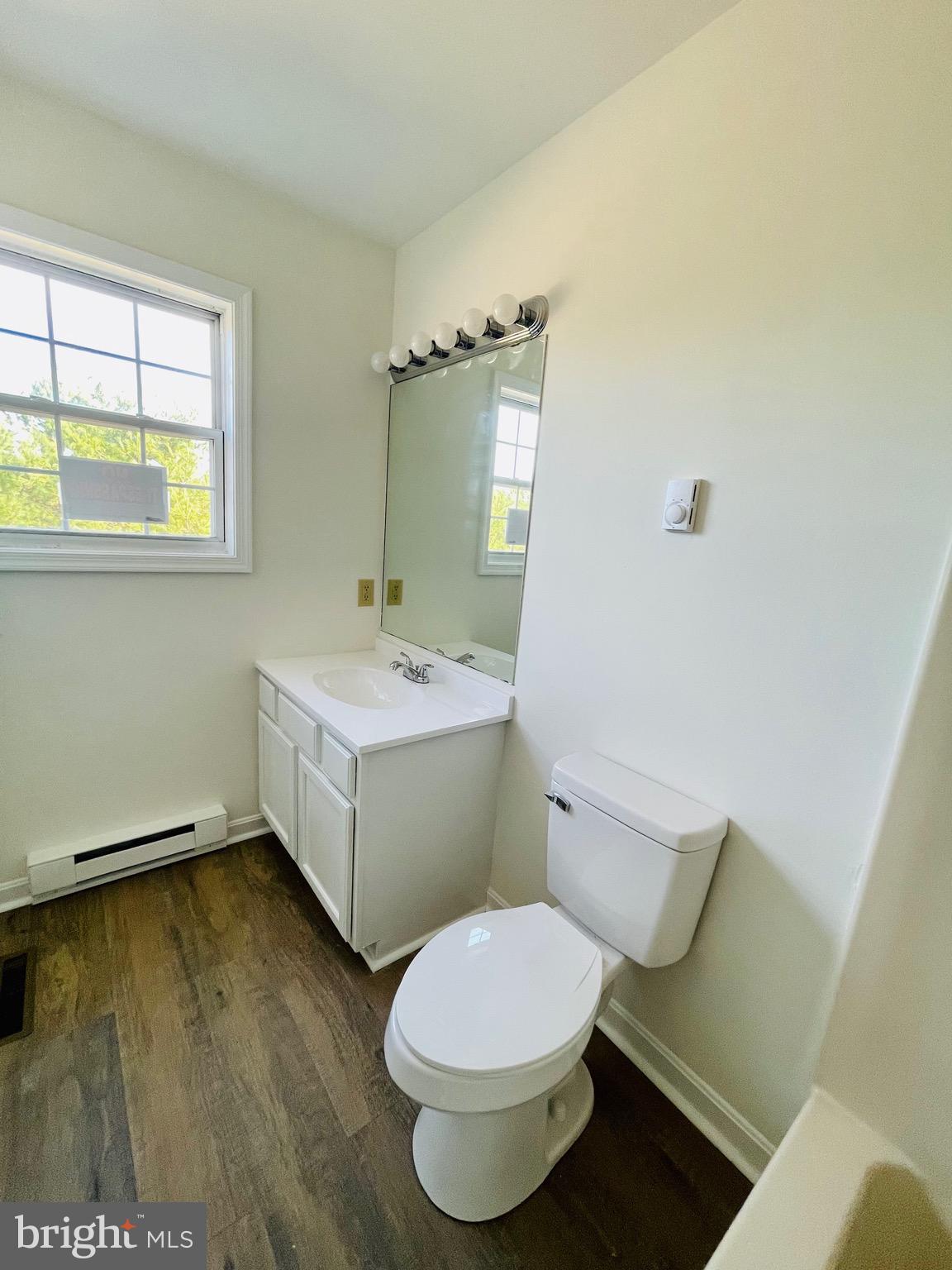 5707 Galestown - Reliance Road Rhodesdale, MD 21659 - Photo 16 of 33 a bathroom with a sink toilet and window