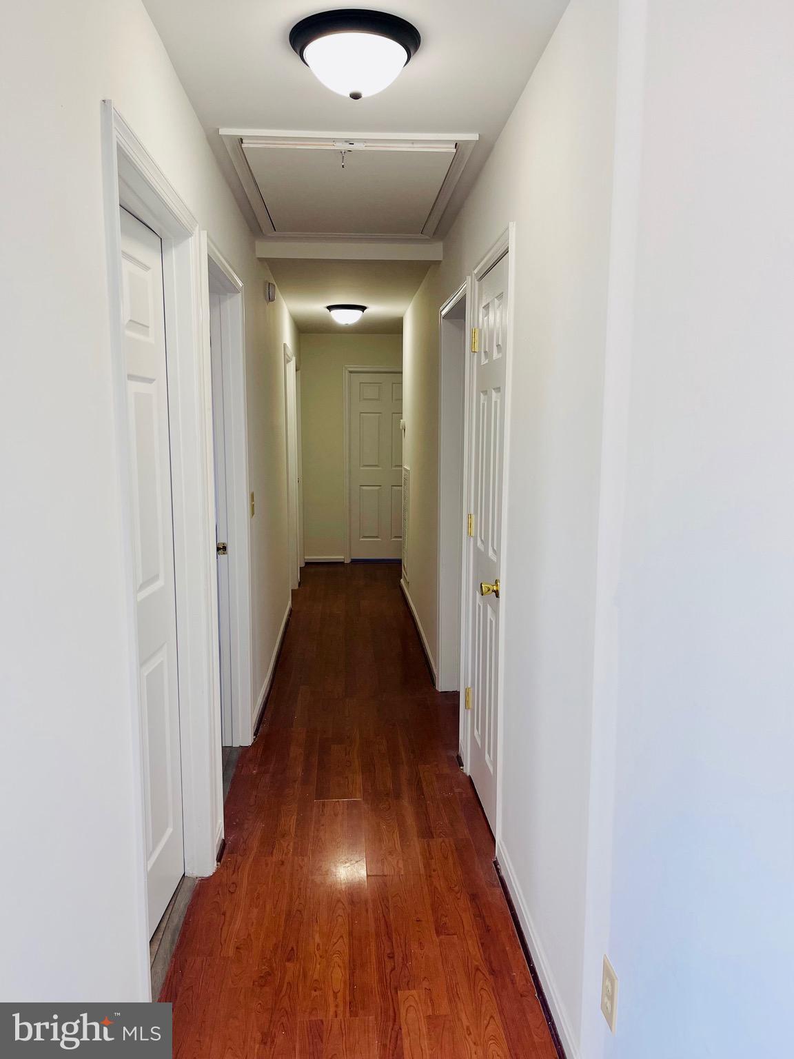 5707 Galestown - Reliance Road Rhodesdale, MD 21659 - Photo 18 of 33 a view of a hallway with wooden floor