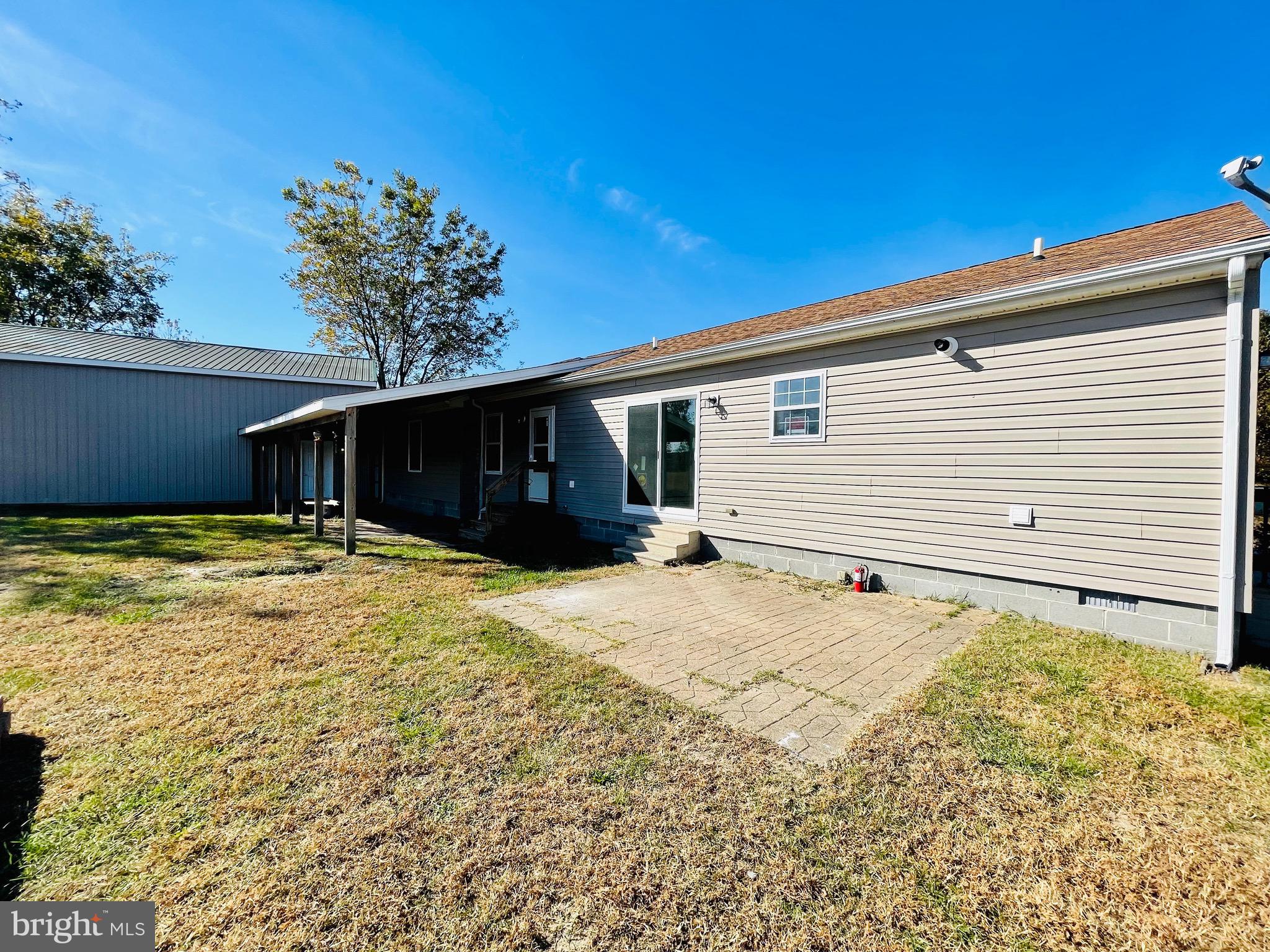 5707 Galestown - Reliance Road Rhodesdale, MD 21659 - Photo 22 of 33 a view of a house with a backyard