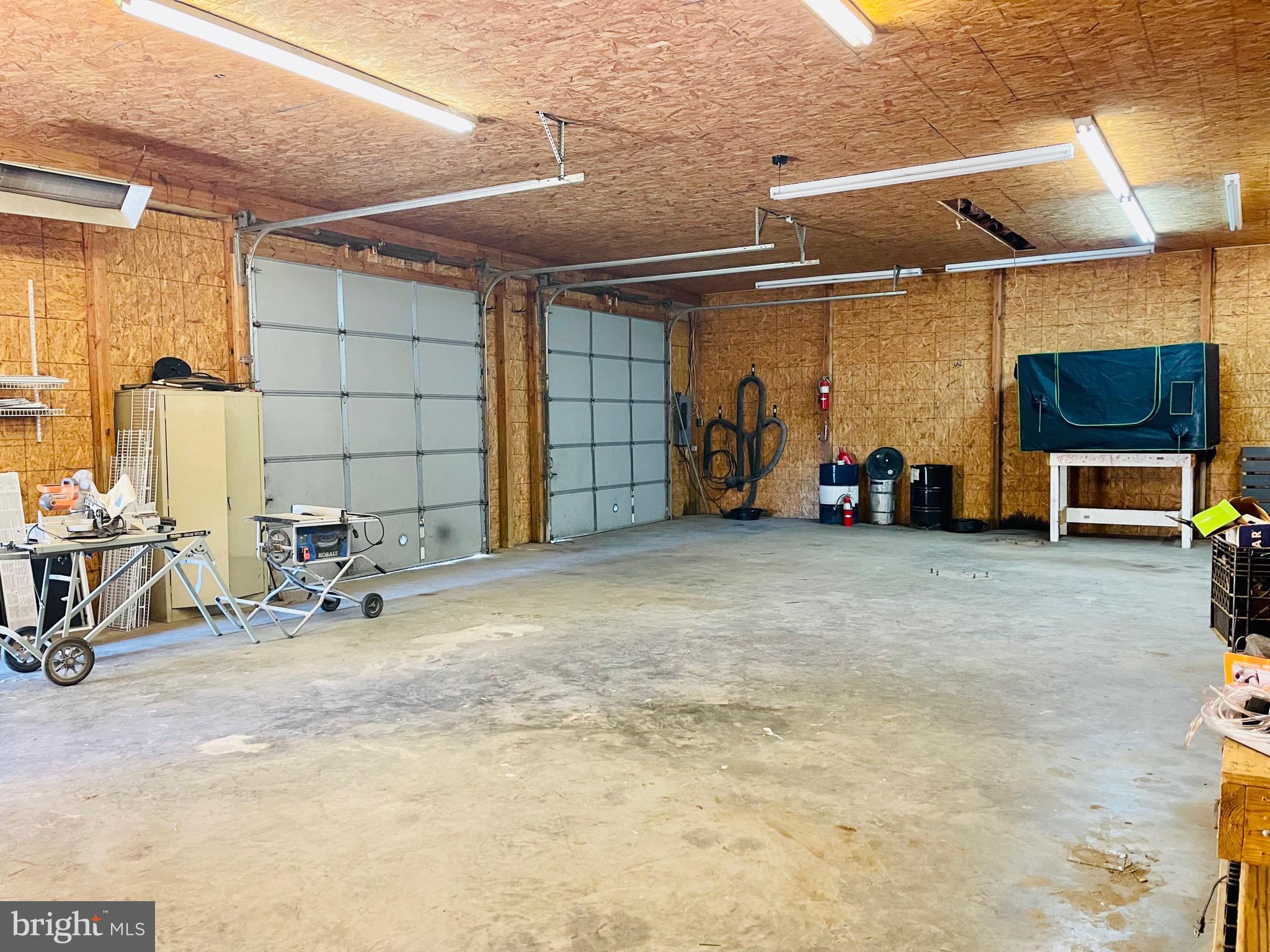 5707 Galestown - Reliance Road Rhodesdale, MD 21659 - Photo 27 of 33 a view of a garage with a table and chairs