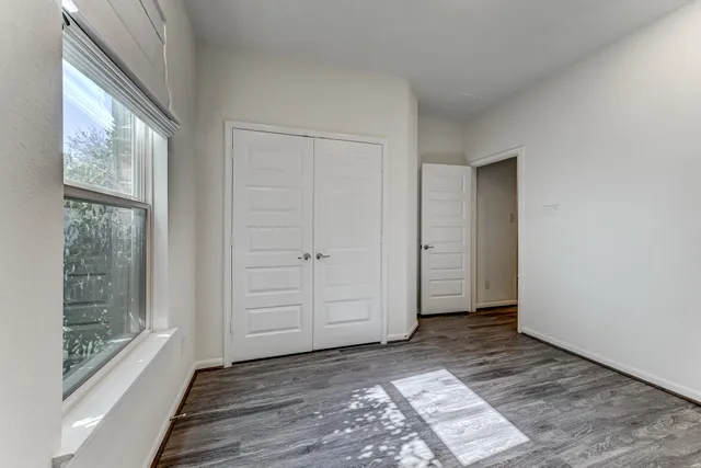 a view of an empty room and window