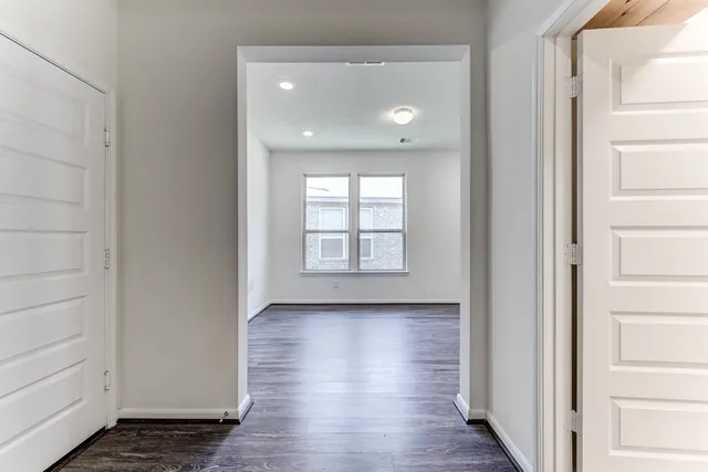a view of entryway with wooden floor