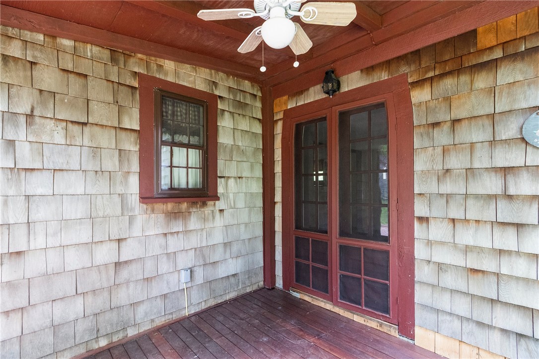 159 Evans Road Glocester, RI 02814 - Photo 42 of 50 Screened porch leads to the dining room.