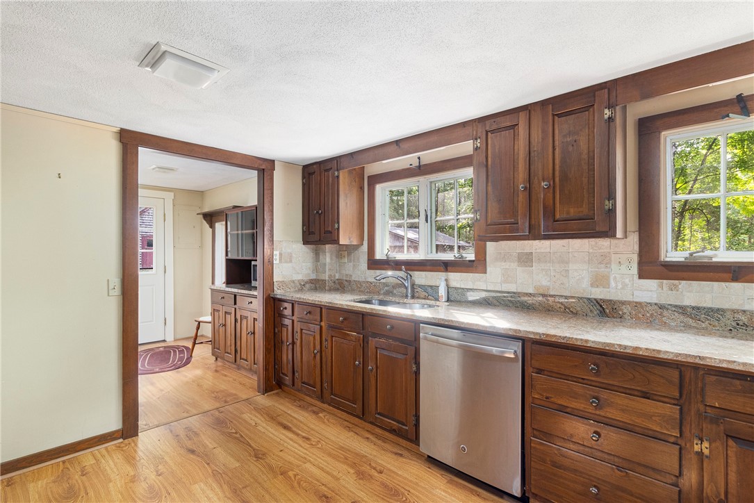 159 Evans Road Glocester, RI 02814 - Photo 9 of 50 Granite counters, tile backsplash and plenty of counter space!