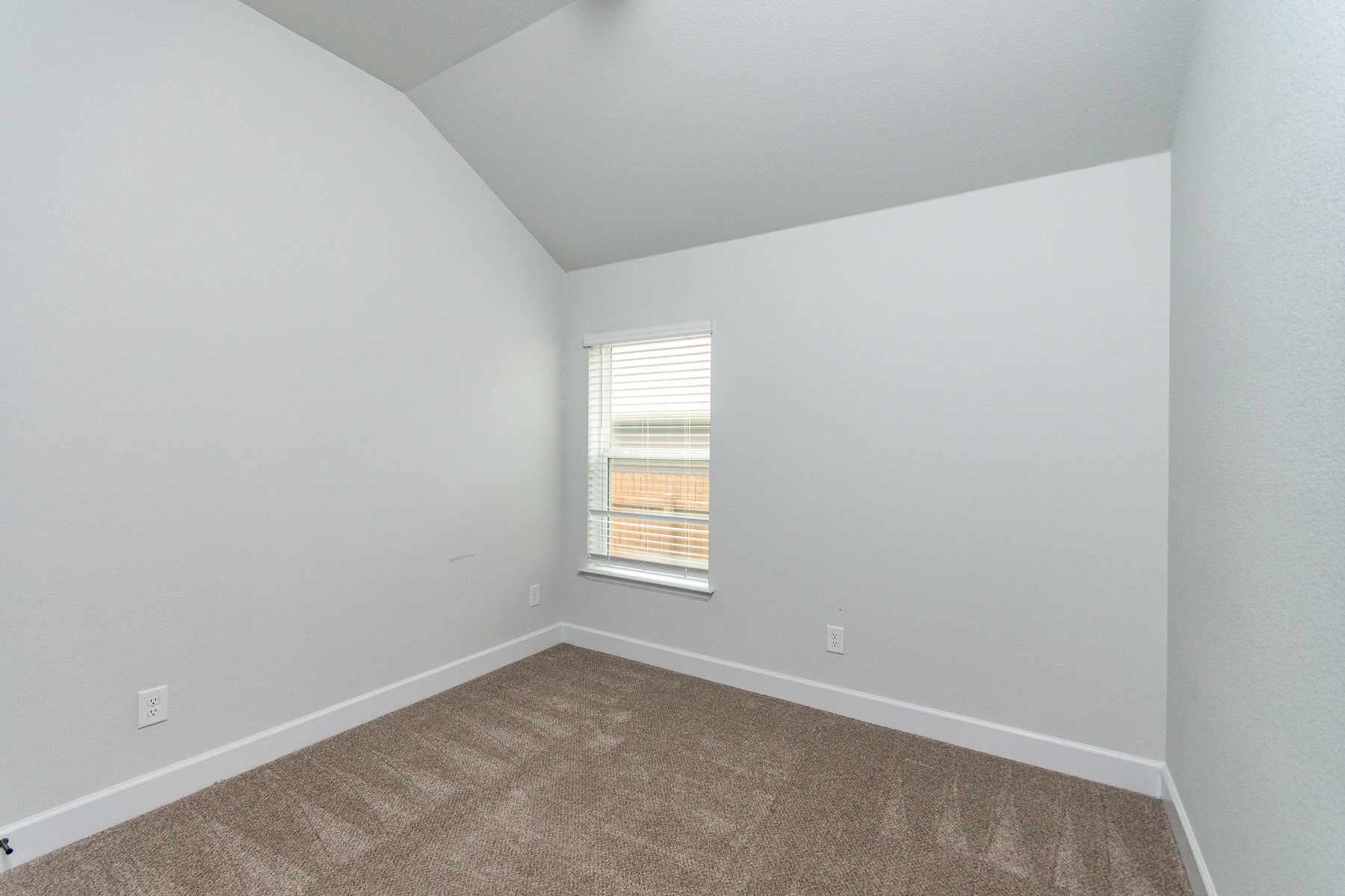 527 Bridgestone Way Buda, TX 78610 - Photo 16 of 21 an empty room with windows