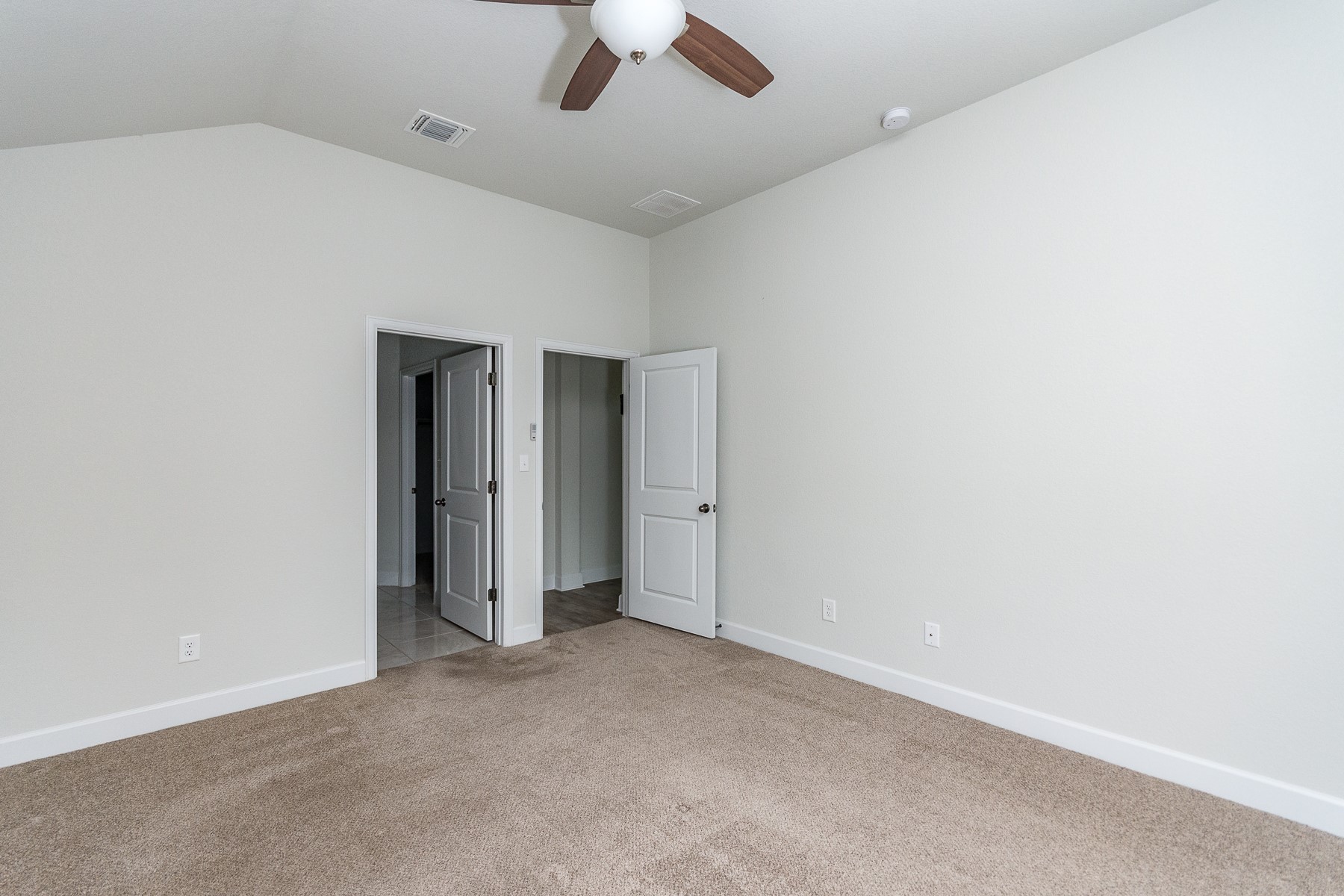 527 Bridgestone Way Buda, TX 78610 - Photo 17 of 21 an empty room with ceiling fan and window