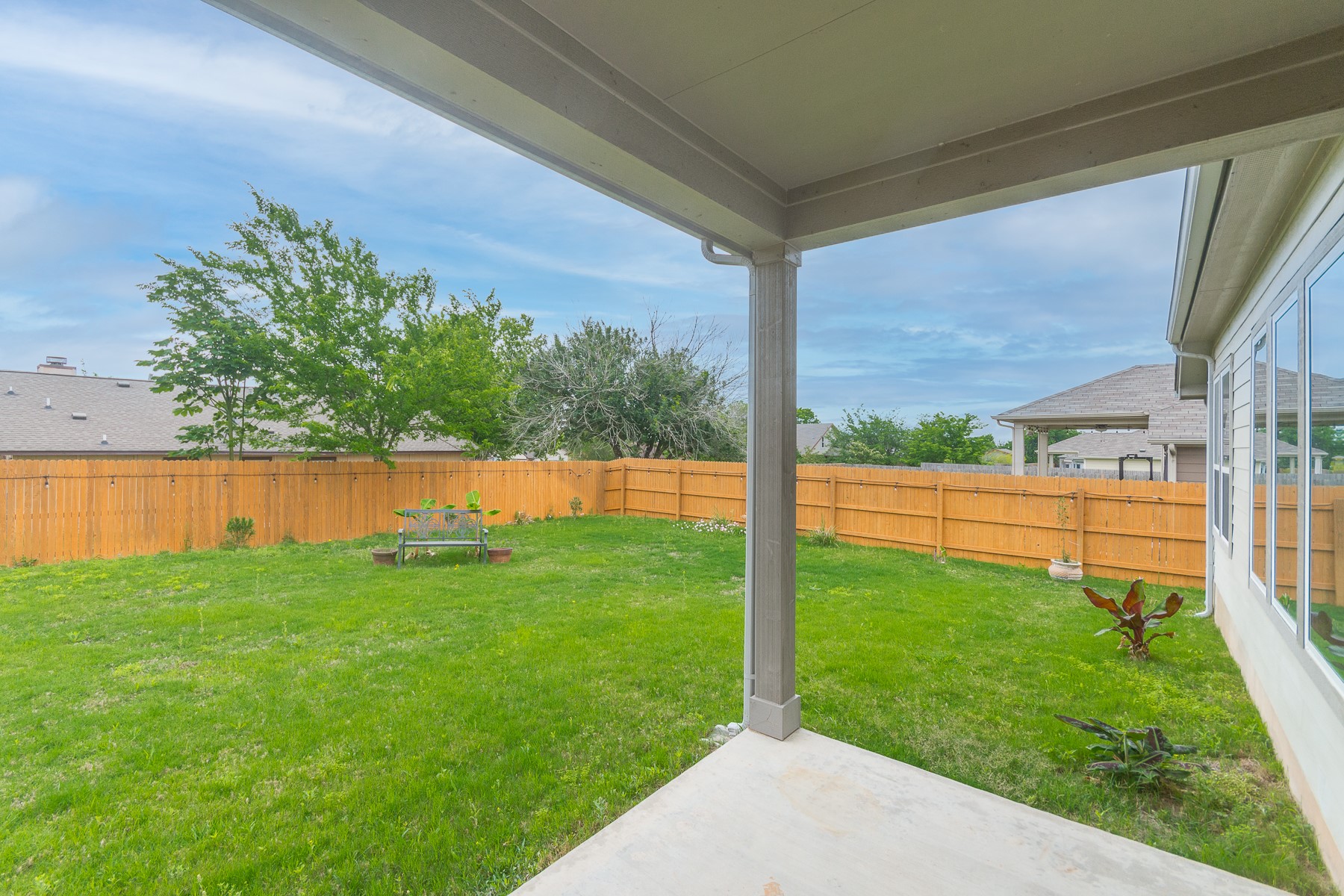 527 Bridgestone Way Buda, TX 78610 - Photo 19 of 21 a view of a back yard