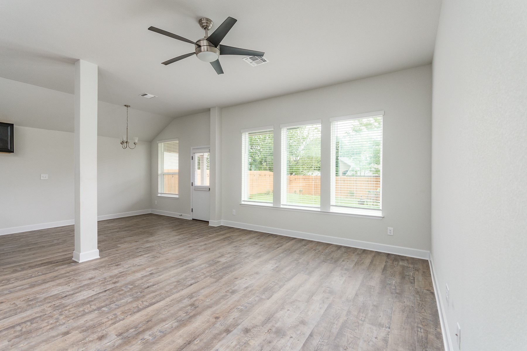 527 Bridgestone Way Buda, TX 78610 - Photo 9 of 21 a view of an empty room with a window