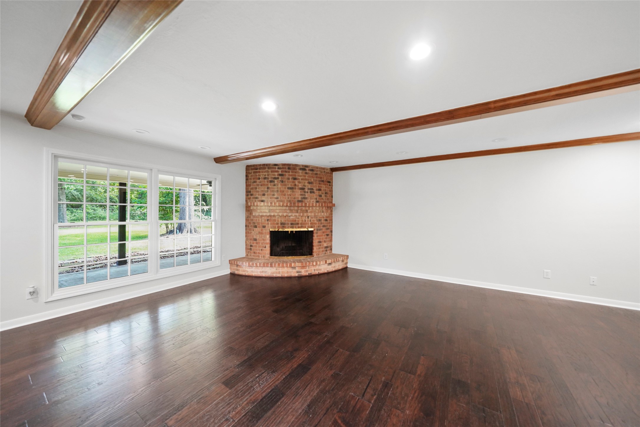 14443 Lyric Road Conroe, TX 77302 - Photo 14 of 49 Family room with custom fireplace