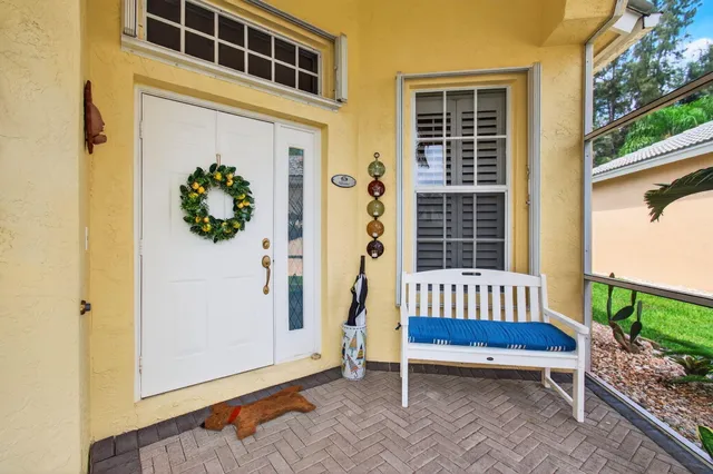 a view of a porch with a bench