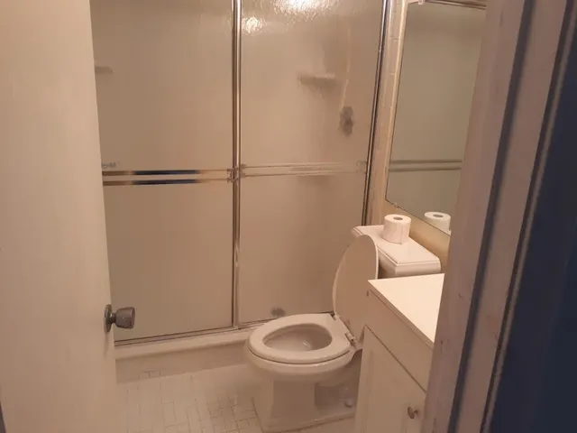 a bathroom with a toilet and a sink