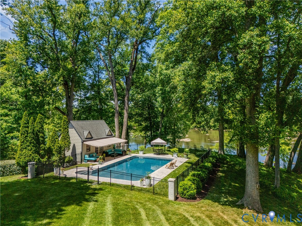 4634 Butte Road Richmond, VA 23235 - Photo 42 of 60 Pool and pool house with safety fence