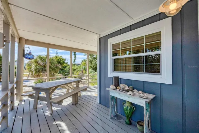 a view of balcony with furniture