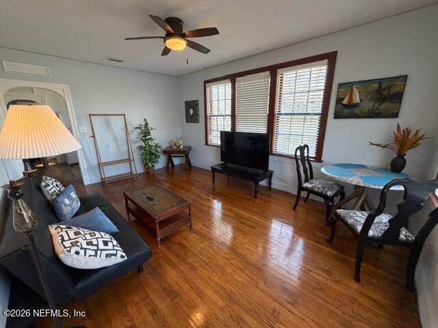 2670 Post Street, Unit 3 Jacksonville, FL 32204 - Photo 2 of 21 a living room with furniture and a flat screen tv with wooden floor