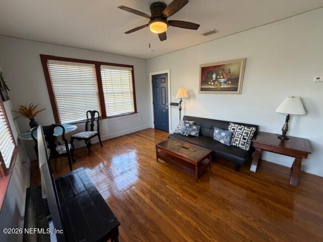 2670 Post Street, Unit 3 Jacksonville, FL 32204 - Photo 3 of 21 a living room with furniture and a wooden floor