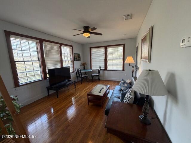 2670 Post Street, Unit 3 Jacksonville, FL 32204 - Photo 4 of 21 a living room with furniture fireplace and a large window