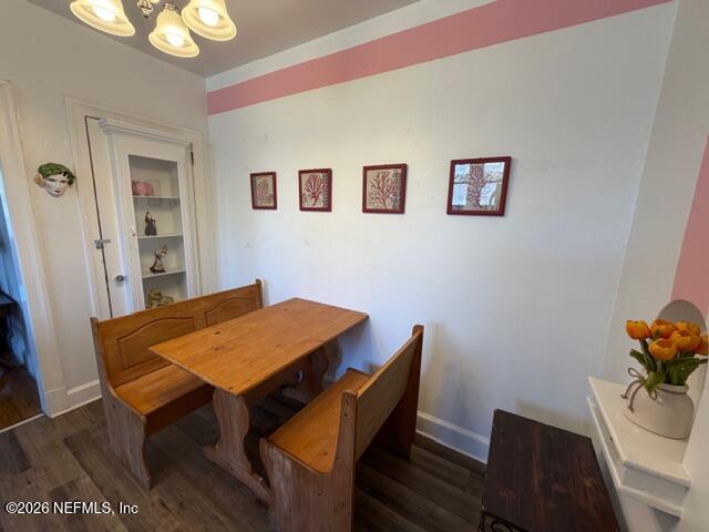 2670 Post Street, Unit 3 Jacksonville, FL 32204 - Photo 9 of 21 a view of a dining room with furniture and wooden floor
