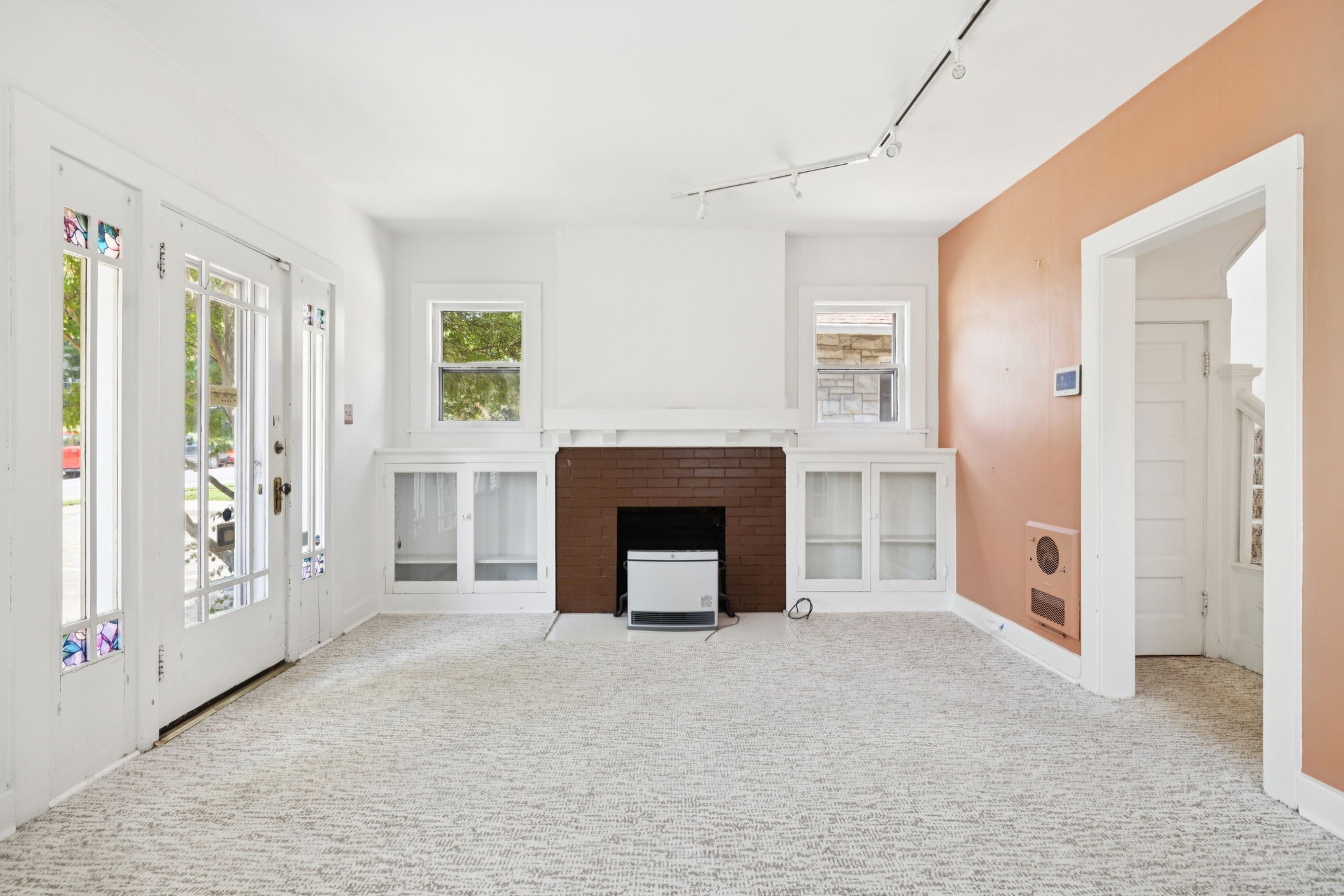 1604 17th Avenue South Nashville, TN 37212 - Photo 11 of 53 a view of a livingroom with a fireplace and window