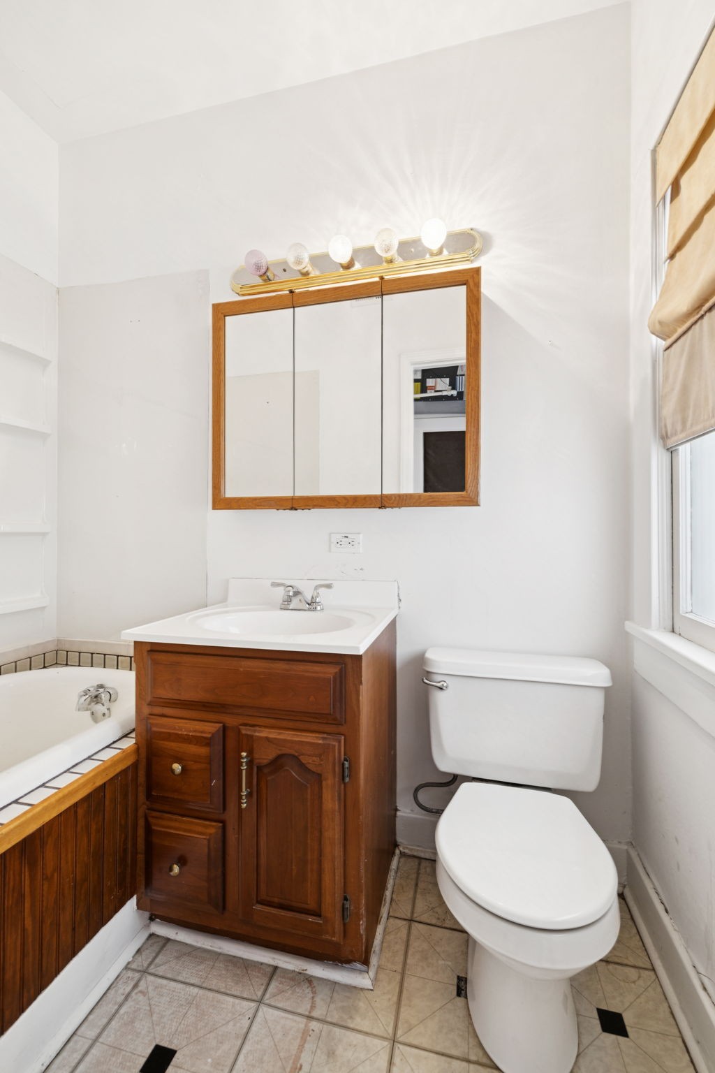 1604 17th Avenue South Nashville, TN 37212 - Photo 30 of 53 a bathroom with a granite countertop toilet sink and mirror