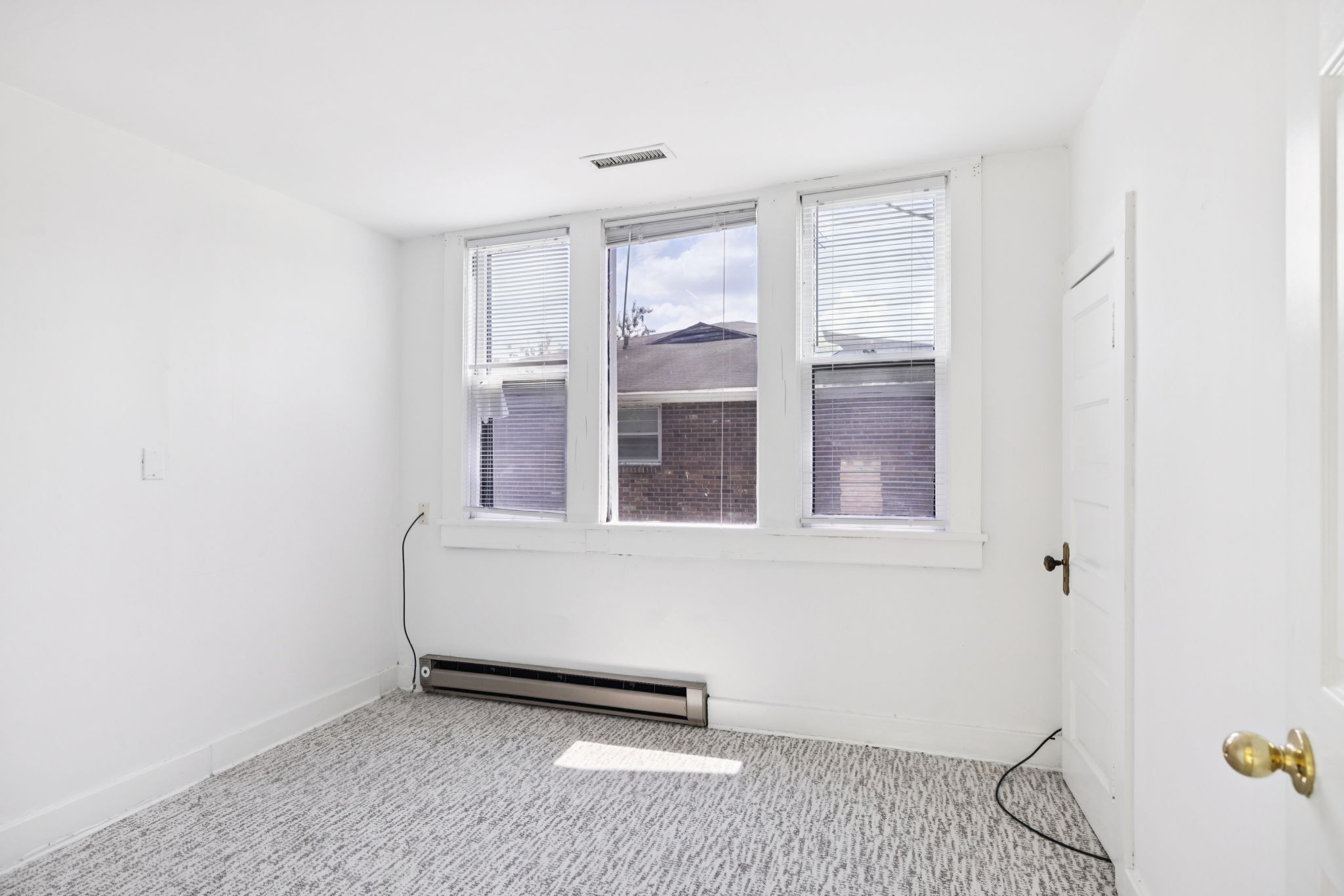 1604 17th Avenue South Nashville, TN 37212 - Photo 35 of 53 a view of an empty room with a window