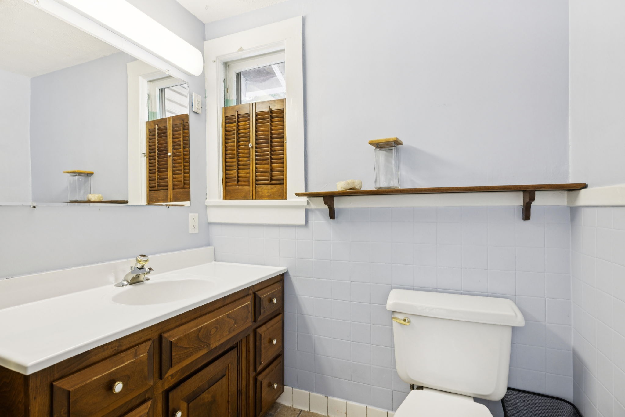 1604 17th Avenue South Nashville, TN 37212 - Photo 40 of 53 a bathroom with a sink mirror vanity and toilet