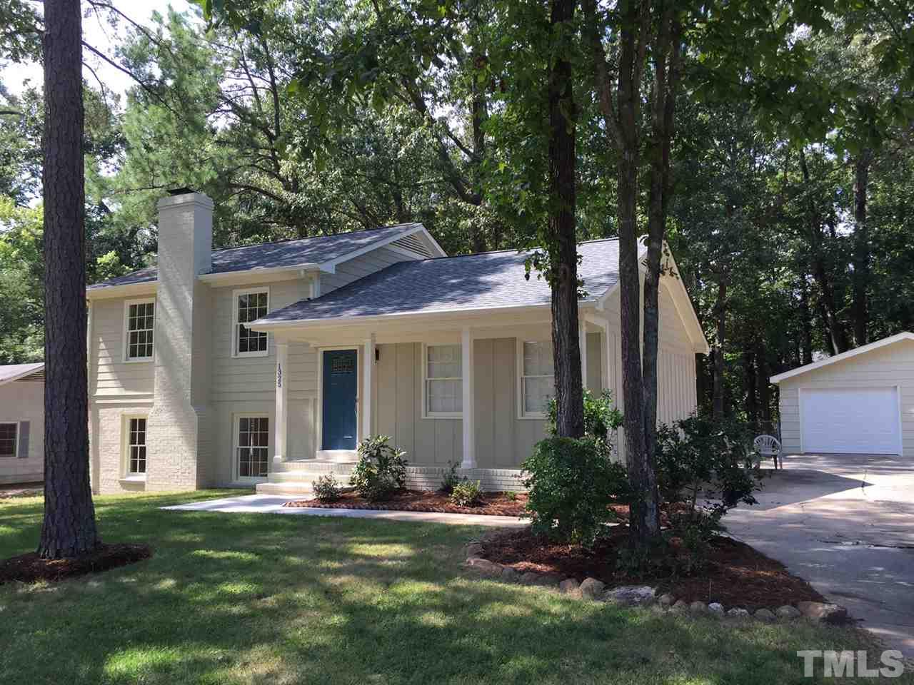 1325 Sedwick Road Durham, NC 27713 - Photo 1 of 16 a view of a house with backyard and garden