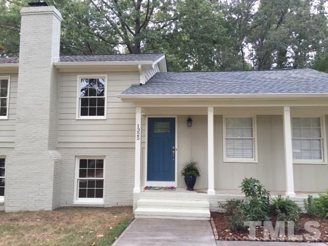 1325 Sedwick Road Durham, NC 27713 - Photo 2 of 16 a front view of a house with a yard