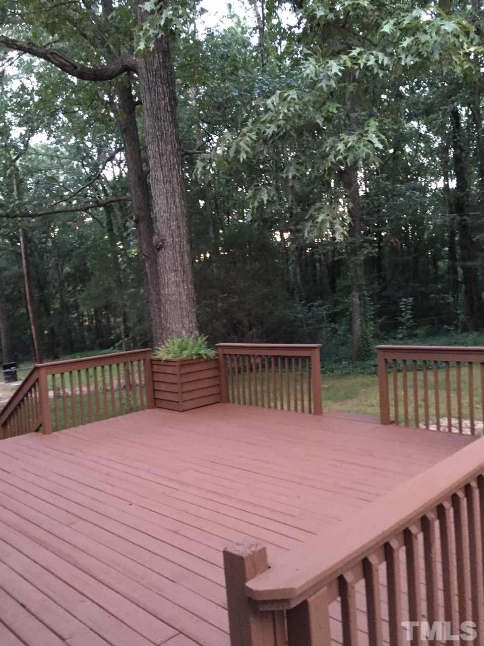 1325 Sedwick Road Durham, NC 27713 - Photo 8 of 16 a view of balcony with wooden deck