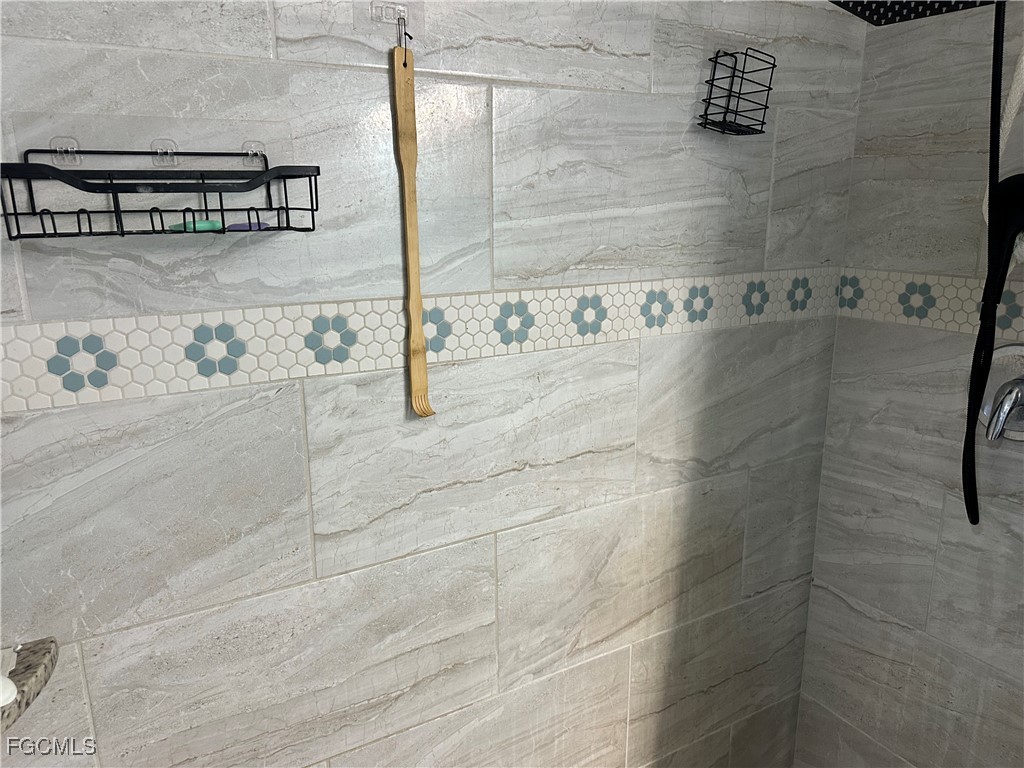 4505 Luckett Road Fort Myers, FL 33905 - Photo 13 of 19 a bathroom with a shower