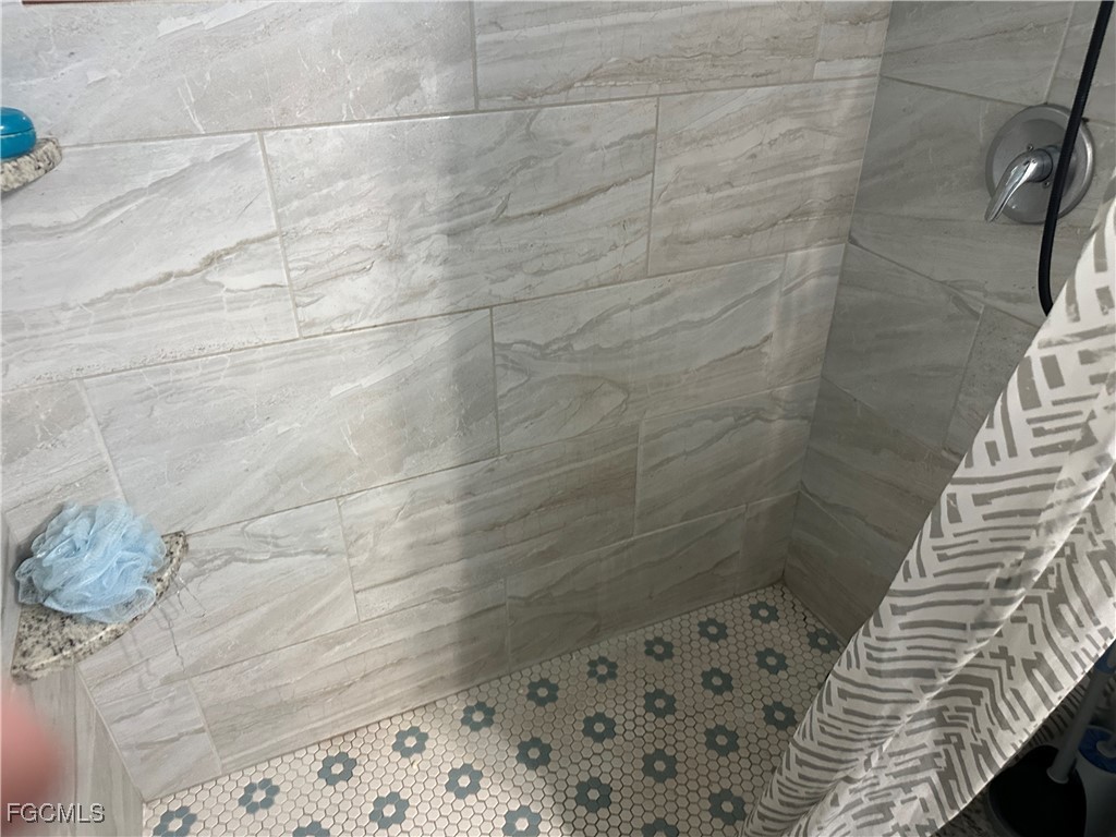 4505 Luckett Road Fort Myers, FL 33905 - Photo 15 of 19 a bathroom with a shower