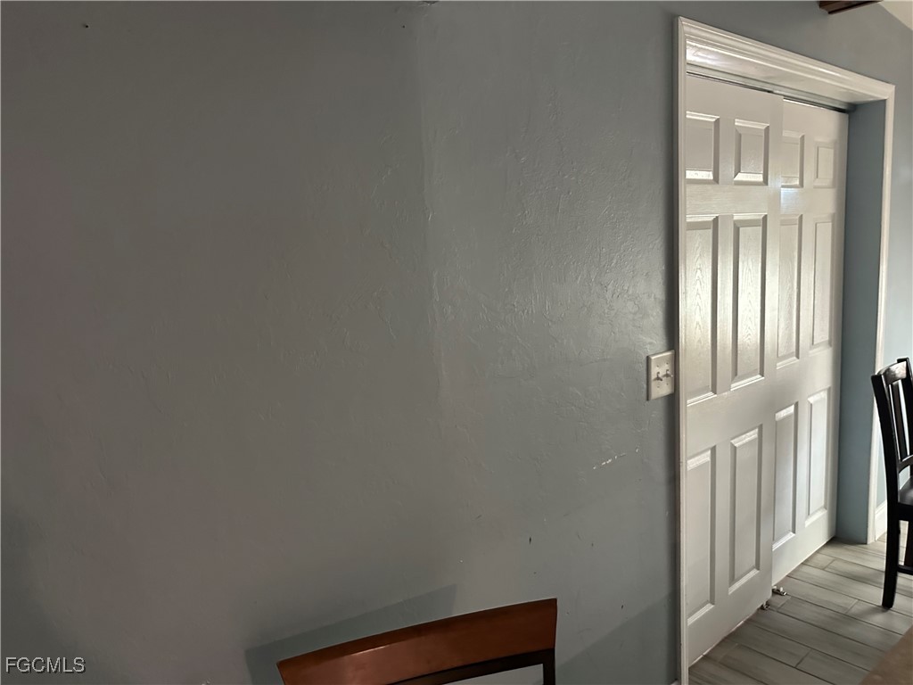 4505 Luckett Road Fort Myers, FL 33905 - Photo 17 of 19 wooden floor in an empty room