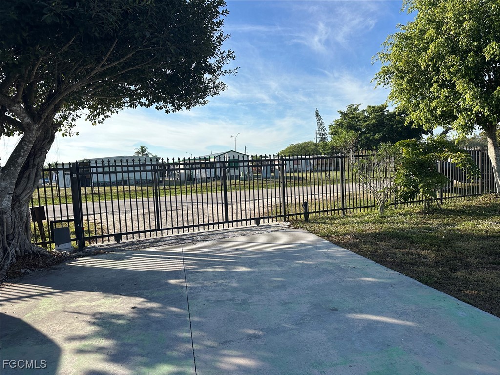 4505 Luckett Road Fort Myers, FL 33905 - Photo 4 of 19 a view of a backyard with a garden