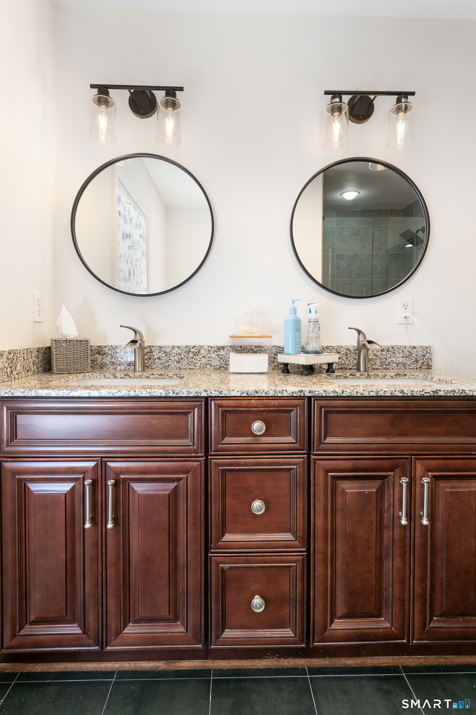 261 Spring Road North Haven, CT 06473 - Photo 29 of 39 a bathroom with a sink and a mirror