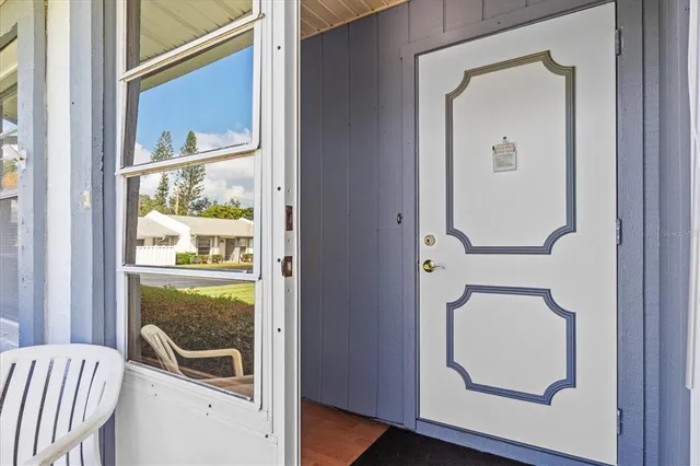 a view of front door and deck