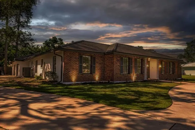 a house view with a garden space
