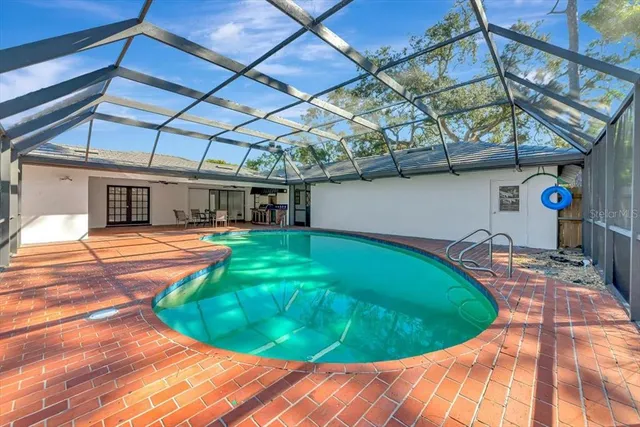 a view of a backyard with a small deck