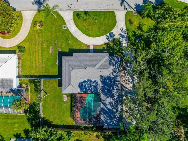 an aerial view of a swimming pool