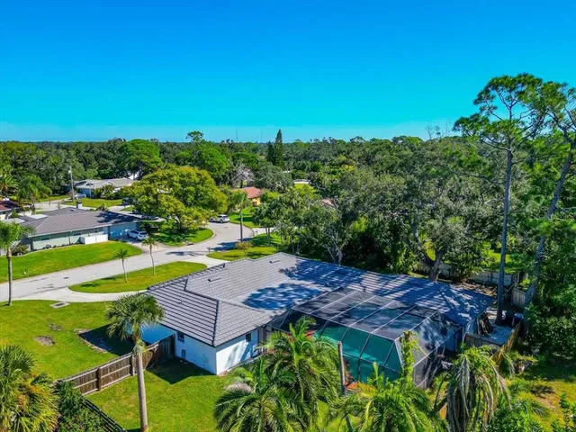 a view of a backyard with plants