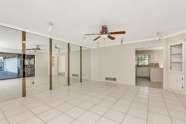 a view of a room with a flat screen tv