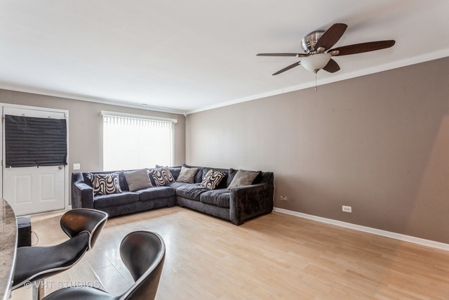 1410 Normantown Road, Unit 1410 Naperville, IL 60564 - Photo 3 of 10 a living room with furniture