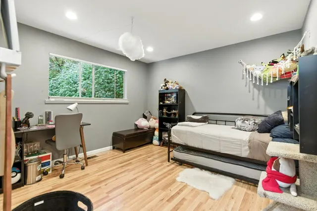 a porch with a bench in front of it