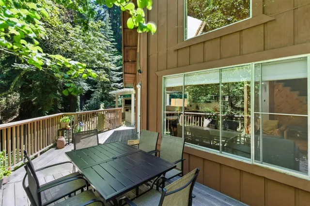 a kitchen that has a sink and a stove