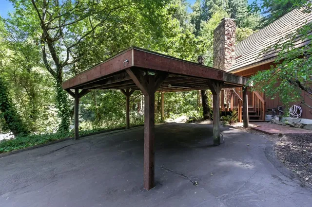 a view of a car parked in a yard