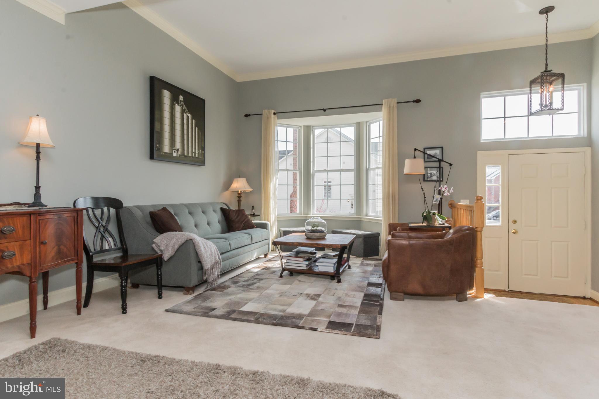 613 Springhouse Square Southeast Leesburg, VA 20175 - Photo 2 of 36 Crown molding, bay window, upgraded entry light
