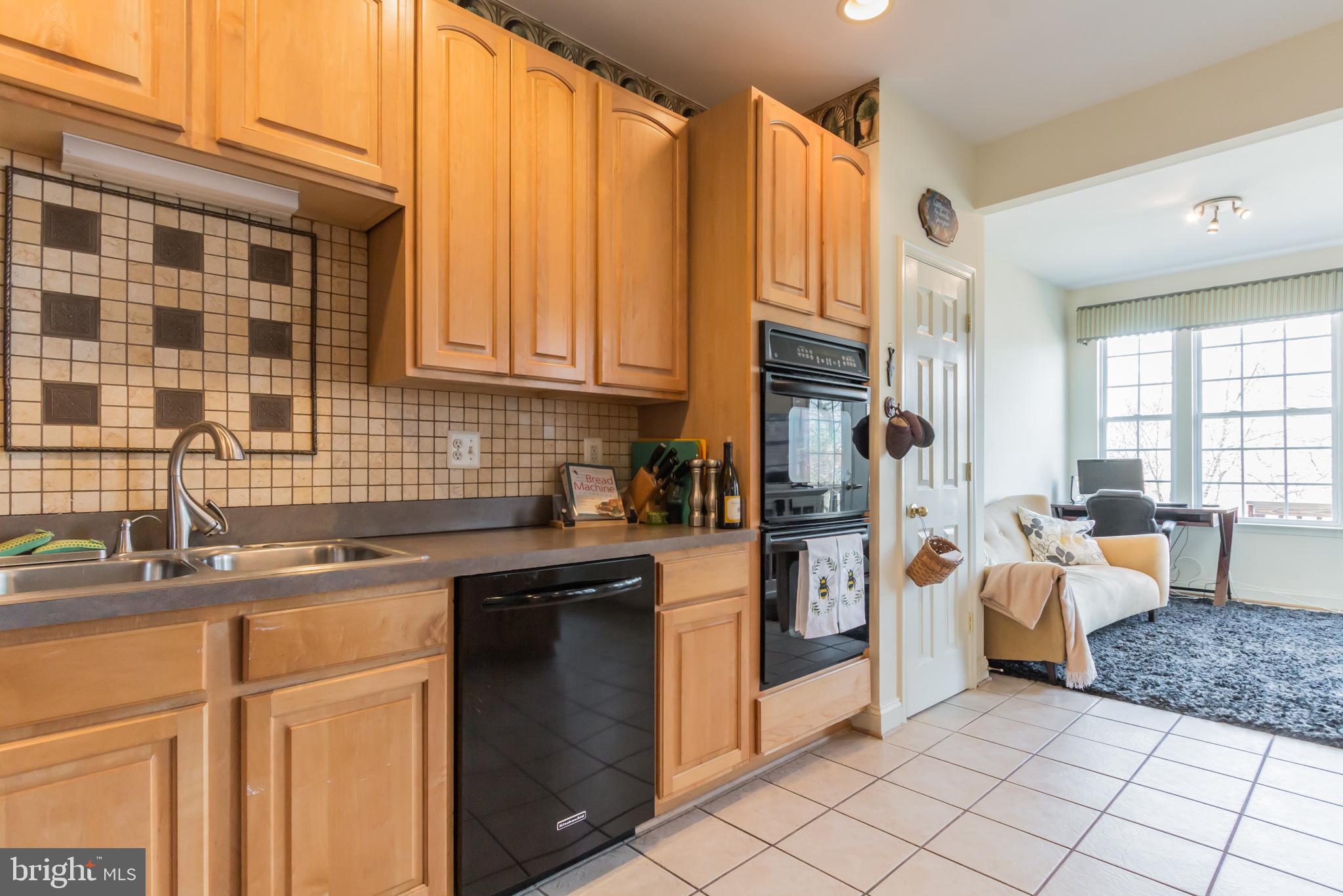 613 Springhouse Square Southeast Leesburg, VA 20175 - Photo 12 of 36 Sunroom off kitchen