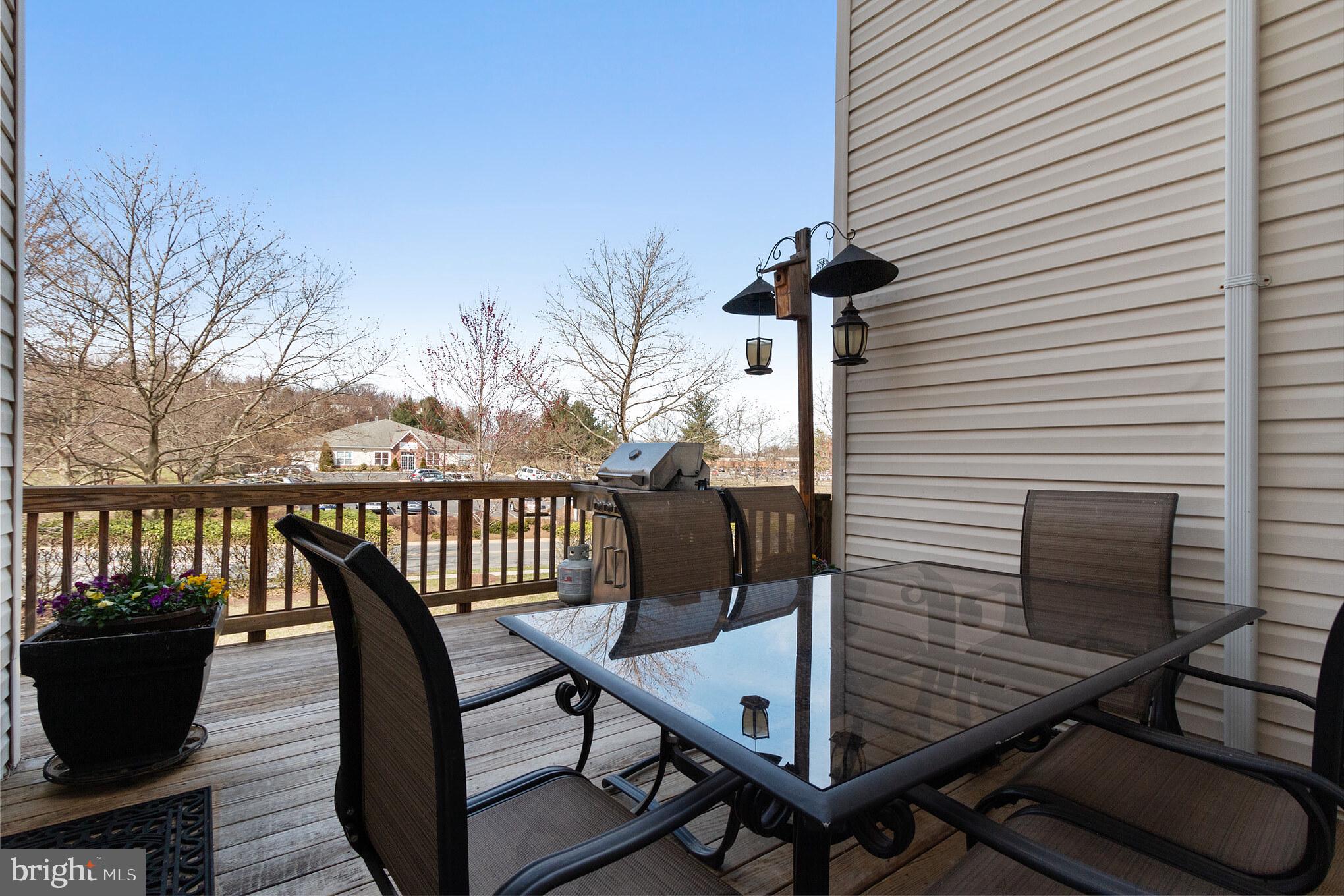 613 Springhouse Square Southeast Leesburg, VA 20175 - Photo 15 of 36 Deck off kitchen/sunroom